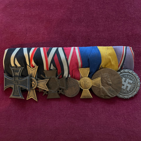 Germany, interesting group of 7: Iron Cross 1914-18, Nazi Cross of Merit, Cross of Honour 1914-18, State Medal, Prussia 25 Years Long Service Cross, 100 Years Kaiser 1797-1897, Luftschutz Medal 1938, covers over 40 years of service in both world wars