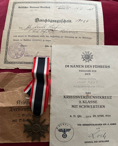 Nazi Germany, War Merit Cross with award document dated 20th April 1944 to Private Arnold Hopf, also includes award document for the Baltic Cross 1920, an interesting lot