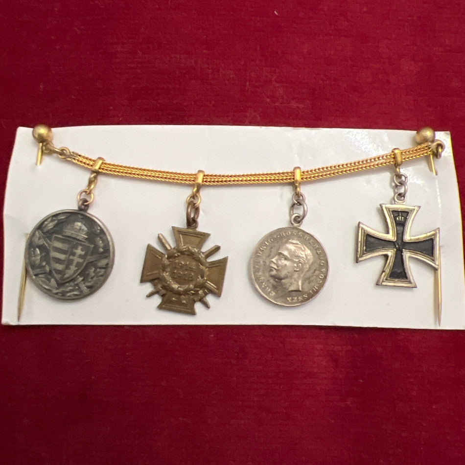 Germany, group of 4 miniatures: Hungary War Service Medal 1914-18, Cross of Honour 1914-18, Hessian State Bravery Medal 1914-18 &amp; Iron Cross 1914-18, on a gilt chain