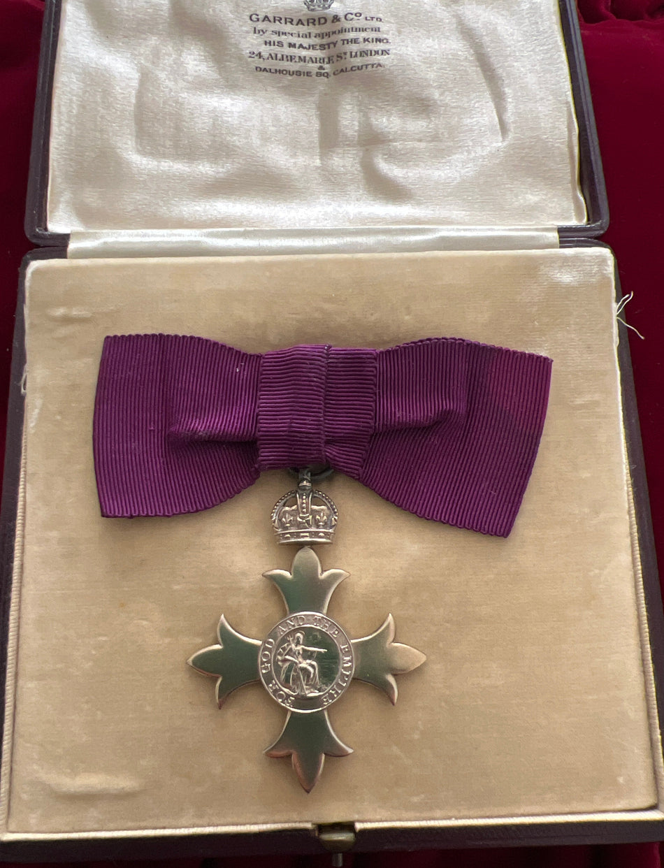 Officer of the British Empire (OBE) on a ladies bow, hallmark for London, 1918, in original case by Garrard & Co. Ltd.