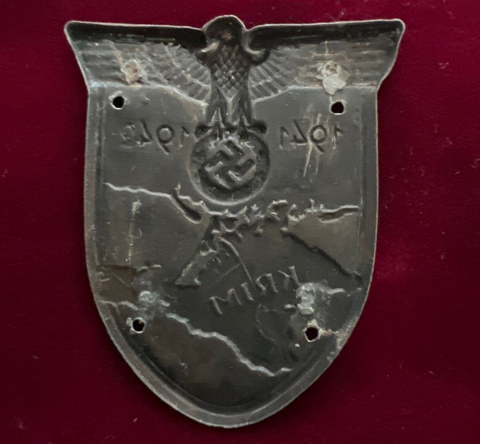 Nazi Germany, Krim Shield, 1941-42 example with backing plate removed, some wear holes to badge, hence pins missing