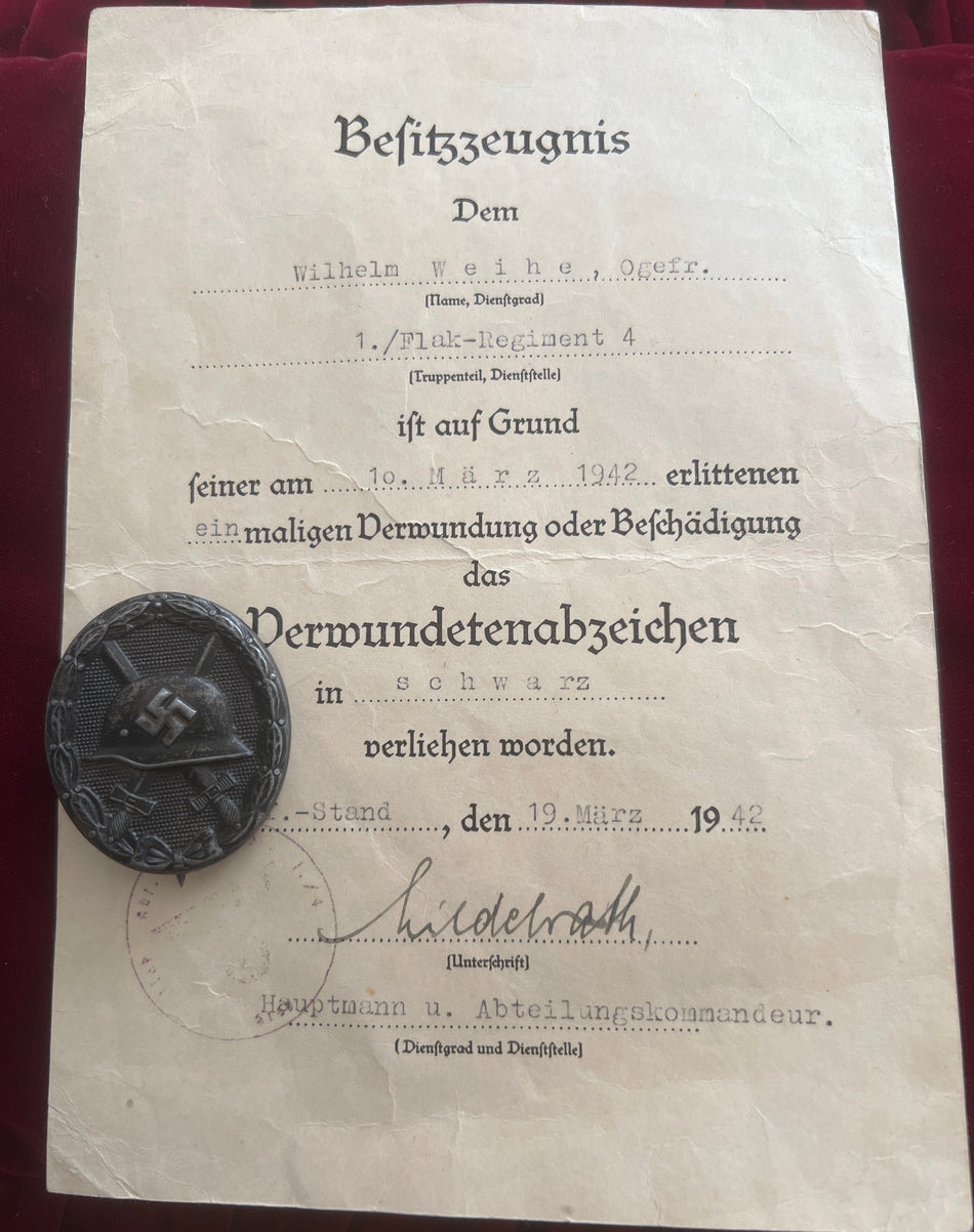 Nazi Germany, Wound Badge with original award document to Wilhelm Writhe, served with the 1/Flak- Regiment, wounded on the 10th March 1942