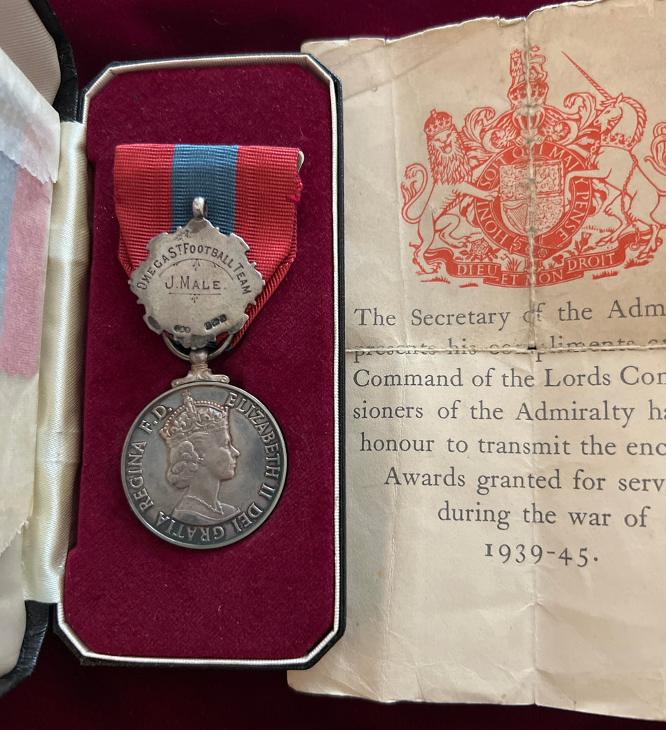 Imperial Service Medal to John Male, with small silver medal for Omega Street Football Team, also comes with a slip showing he served in the navy in WWII, entitled to 6 medals