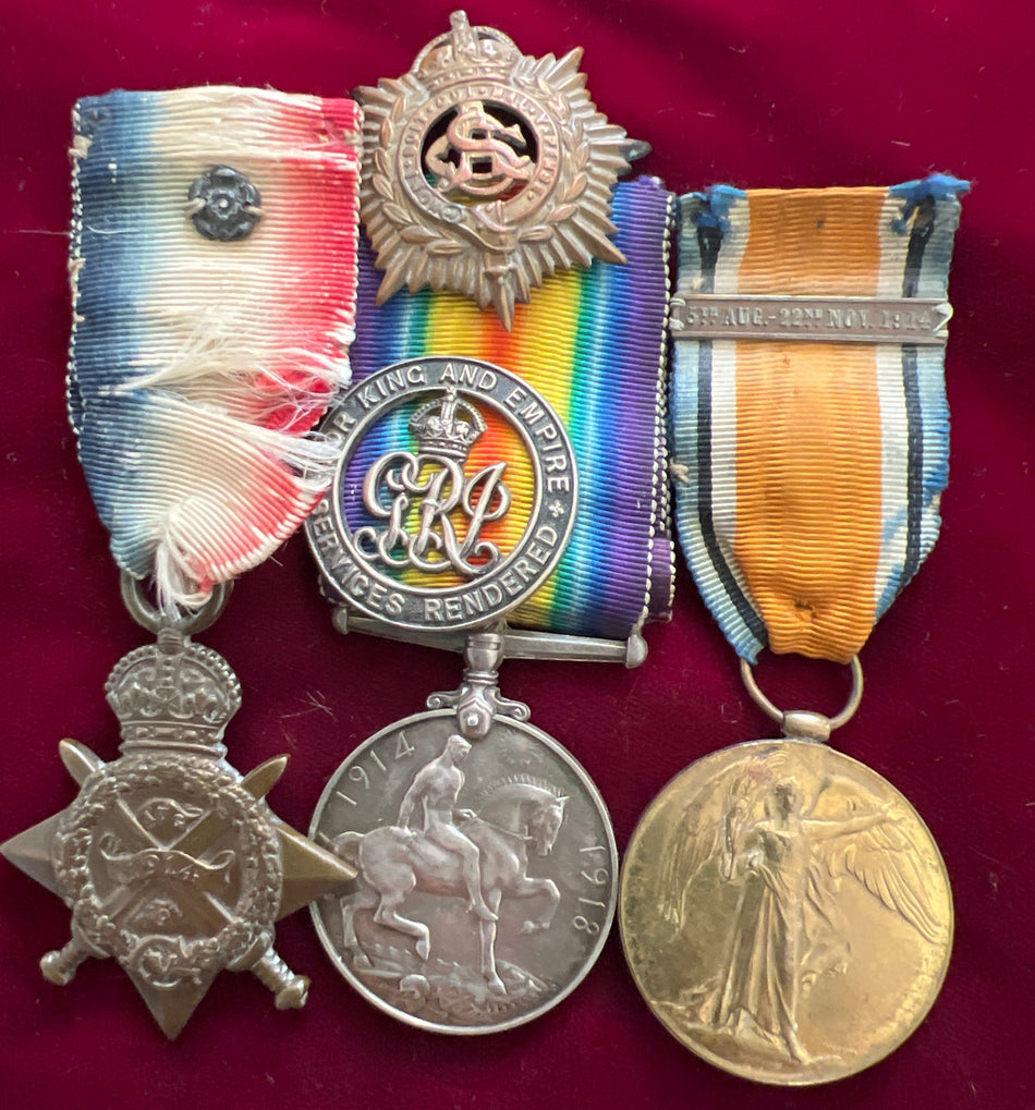 1914 Star with rosette/ Victory Medal/ British War Medal trio to 1614 Private R. Baker, Army Service Corps, note ribbons mixed up, also the bar is on the victory medal ribbon, with his wound badge broken and cap badge missing the slider
