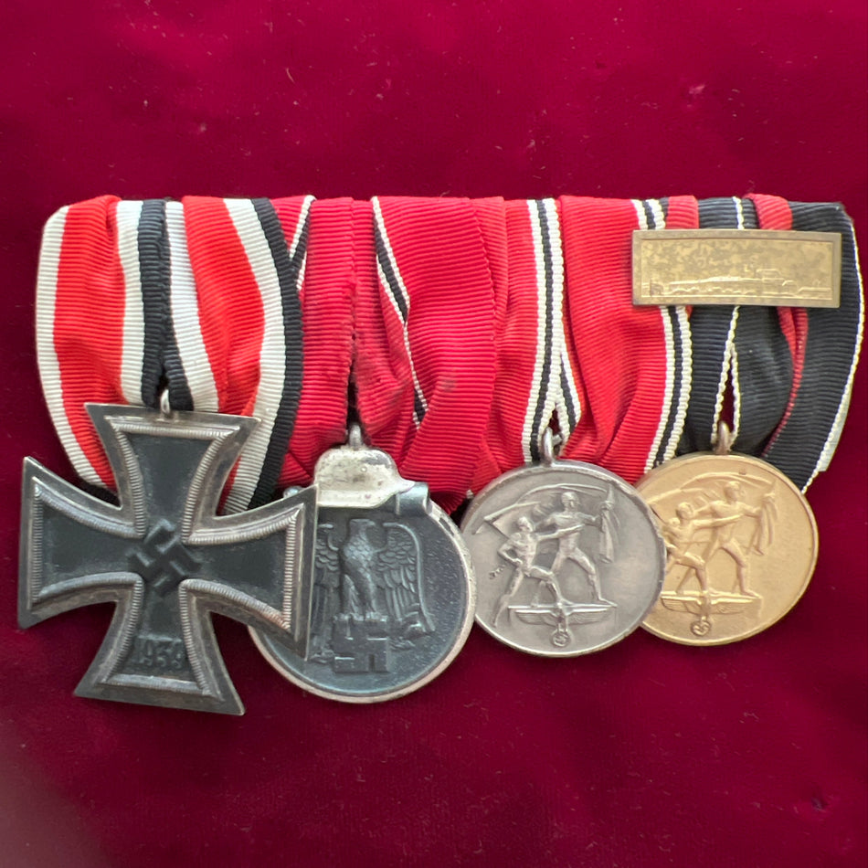 Nazi Germany, group of 4: Iron Cross, Russian Front Medal 1941-42, Entry into Austria Medal & Entry into Czechoslovakia Medal with Prague bar, all good examples of medals