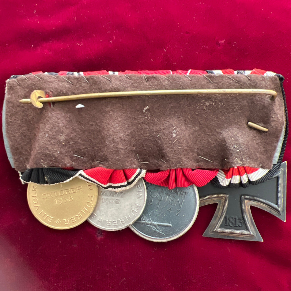 Nazi Germany, group of 4: Iron Cross, Russian Front Medal 1941-42, Entry into Austria Medal & Entry into Czechoslovakia Medal with Prague bar, all good examples of medals