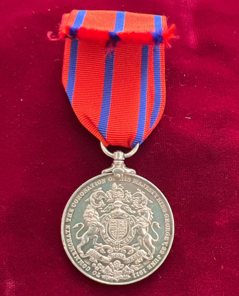 Unusual King George V Coronation Medal, 1911, named to P.C. Pound, struck in silver