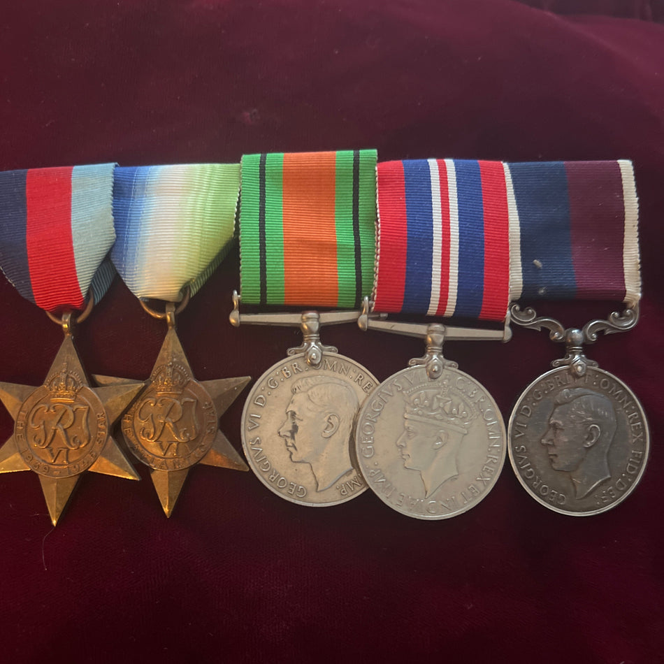 RAF Coastal Command group of 5 to 564062 Earnest Montague Price, flew operations Coastal Command Pilot Officer 1940, joined 14/1/1930 retired Wing Commander 1/7/1969, see service history