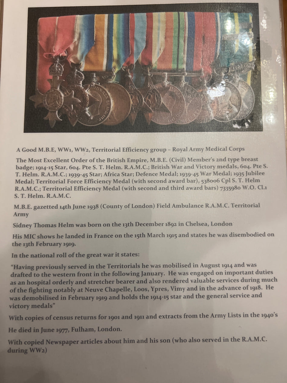 Group to Regimental Quarter Master Sergeant Sidney Thomas Helm MBE, RAMC, born Chelsea 1892, France 1915-18 stretcher bearer at Neuve Chapelle Loos Ypres Vimy Ridge, TA service, Jubilee 1935, WW2 RSM 1940-44, died 1977, with news cutting and history