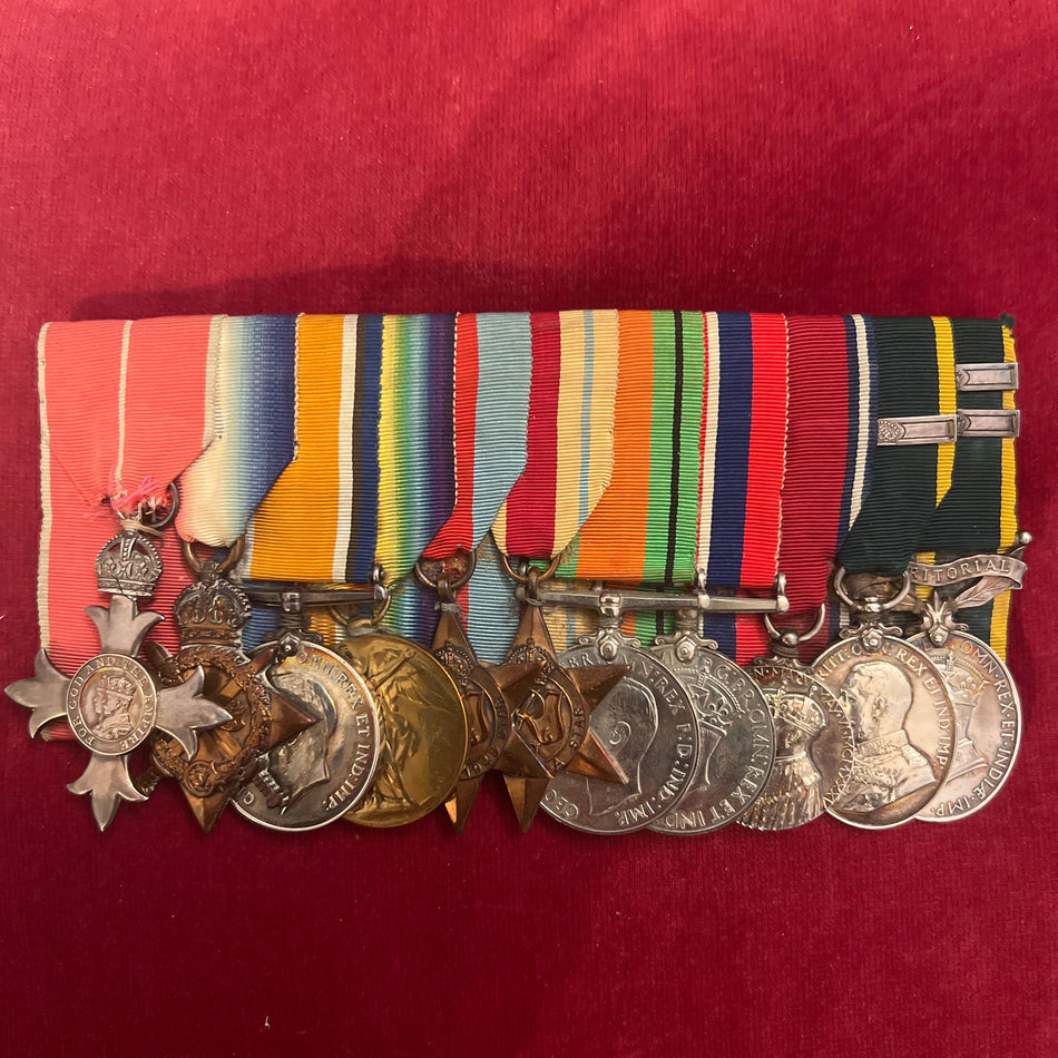 Group to Regimental Quarter Master Sergeant Sidney Thomas Helm MBE, RAMC, born Chelsea 1892, France 1915-18 stretcher bearer at Neuve Chapelle Loos Ypres Vimy Ridge, TA service, Jubilee 1935, WW2 RSM 1940-44, died 1977, with news cutting and history