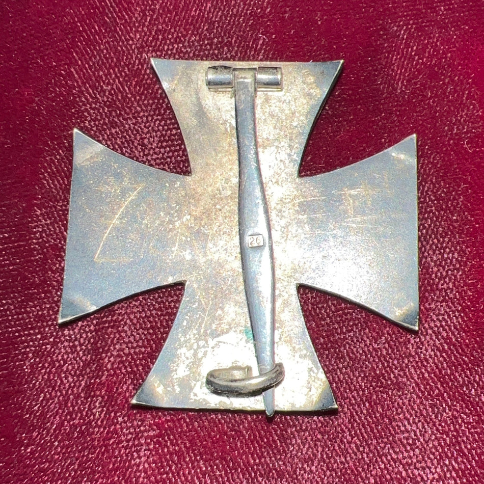 Nazi Germany, Iron Cross, 1st class, maker marked number 26, an interesting example with points curved to edges of cross, some wear