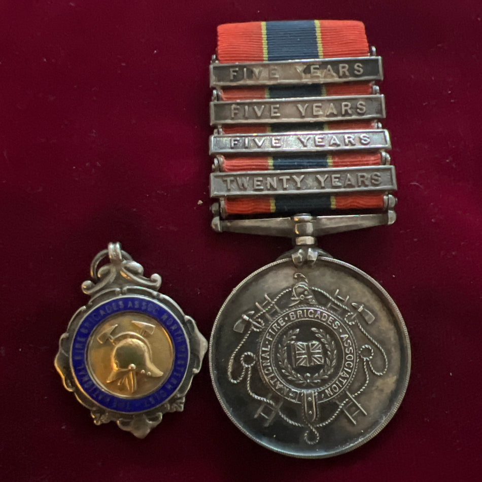 National Fire Brigades Association Long Service Medal to G.W. & Co Ltd., The Brewery, St. Helens, 1914-1950, Thomas J Feeney, also comes with a silver medal National Fire Brigade Assoc. North Western Assoc. for Hand Pump & Bucket Race, sold as a pair