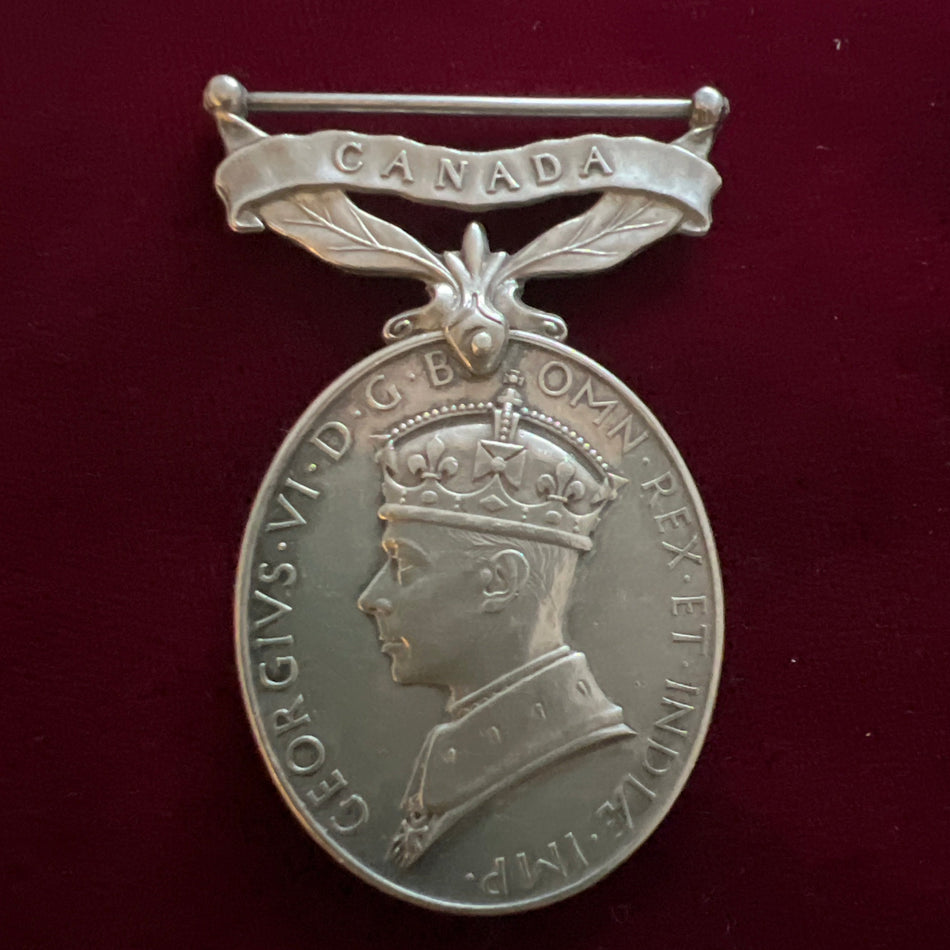 Efficiency Medal with CANADA bar, to Trooper F. P. Flack, Canadian Armoured Corps