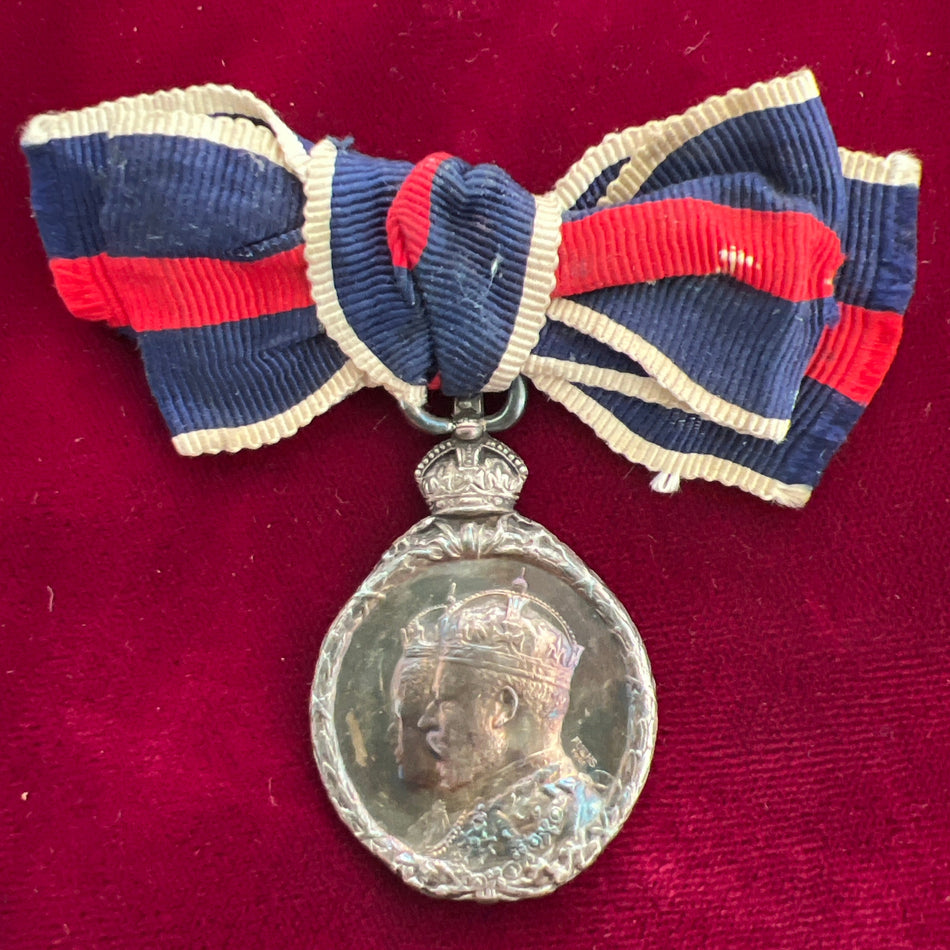 King Edward VII Coronation Medal in silver, 1902, on ladies bow