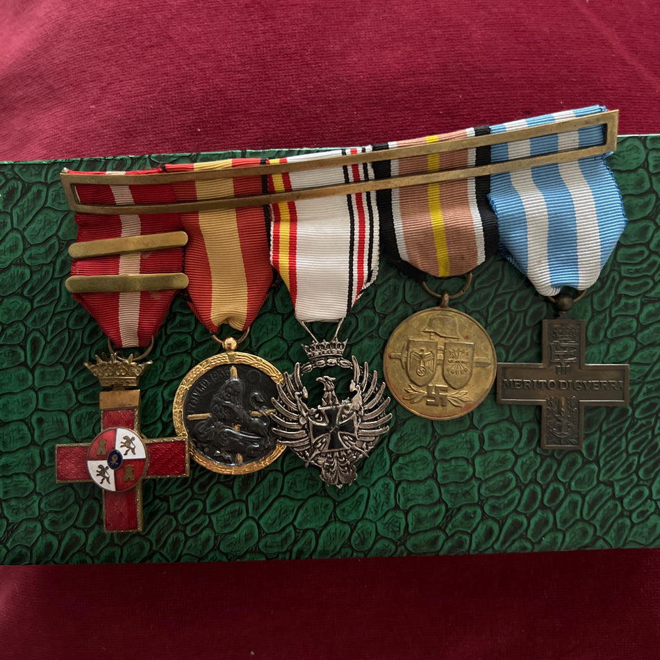 Spain, Blue Division group of five: Military Merit Cross with two bars, Campaign Medal 1936-39, German Eastern Front Medal 1941-42 with Spanish shield, Blue Division Medal and Italian War Merit Cross, mounted, in fitted case