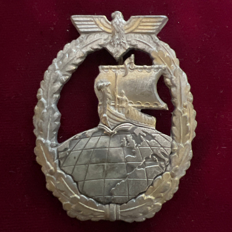 Nazi Germany, Auxiliary Cruiser War Badge, mid to late war, two-piece made, some wear to gilt, a good example of type