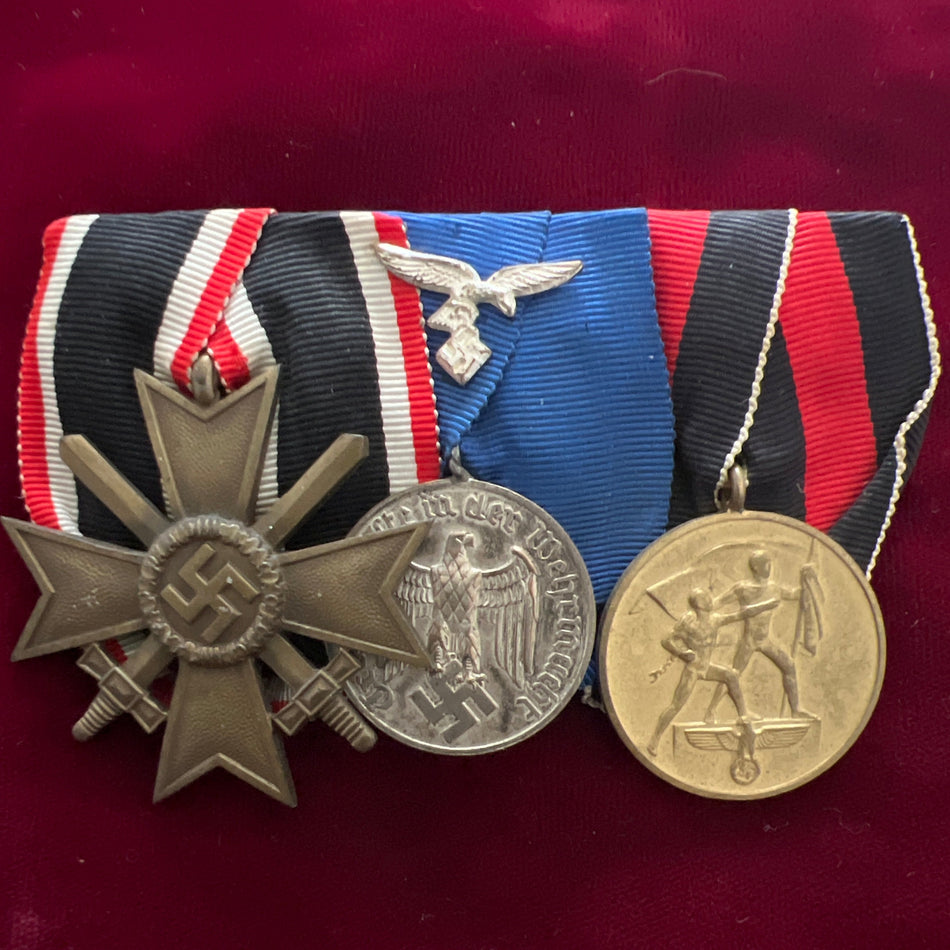 Nazi Germany, group of 3, War Merit Cross, Armed Forces 4 Years Long Service Medal with Luftwaffe bar and Entry into Czechoslovakia, a good example of type