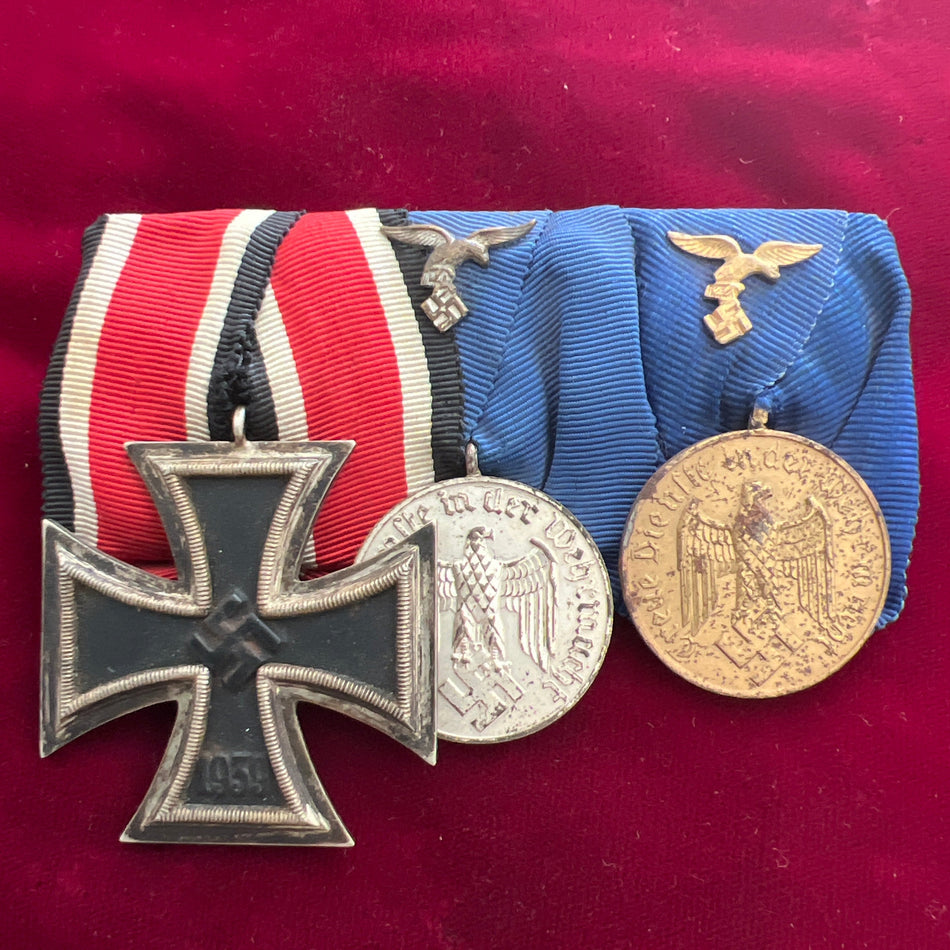 Nazi Germany, group of 3, Iron Cross, 4 Years Long Service Medal and 12 Years Long Service Medal, with Luftwaffe emblems, good tone to the medals