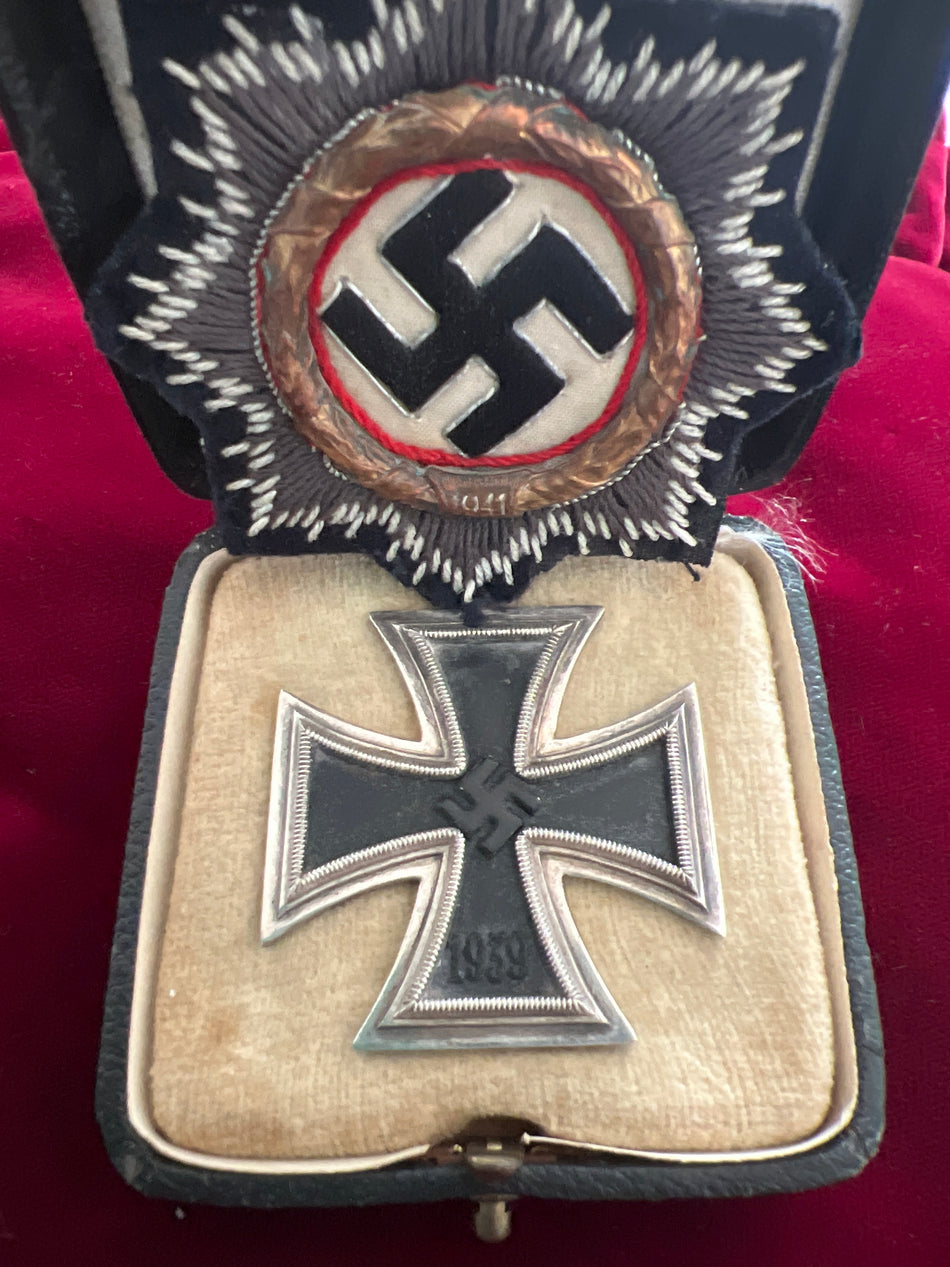 Nazi Germany, German Cross in cloth plus Iron Cross 1st class in original case, both came in together, note imprint in case, German Cross is believed to be a Kriegsmarine type, an interesting pair