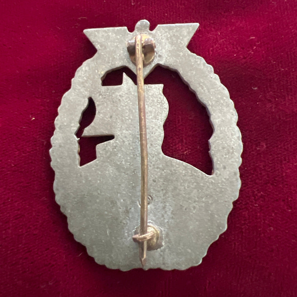 Nazi Germany, Auxiliary Cruiser War Badge, two-piece type, mid-war, unmarked, some wear