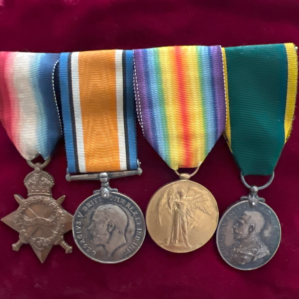 Group of 4 to 2241 Private E. Davis, Royal Welsh Fusiliers, 1914-15 Star, British War Medal, Victory Medal &amp; Territorial Efficiency Medal