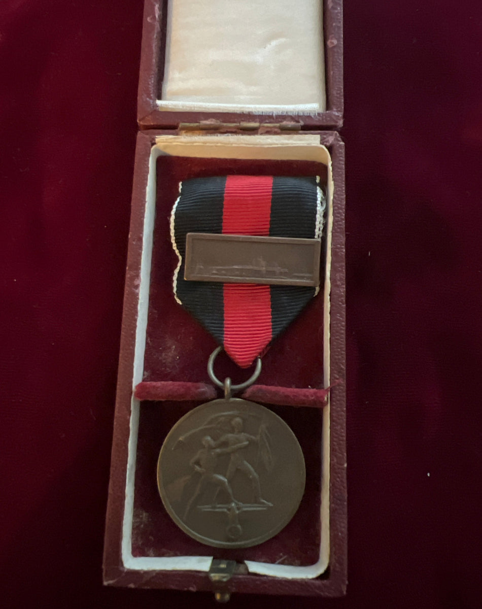 Nazi Germany, Entry into Czechoslovakia Medal, 1938, with Prague bar, in original case of issue, some wear, a good example of type