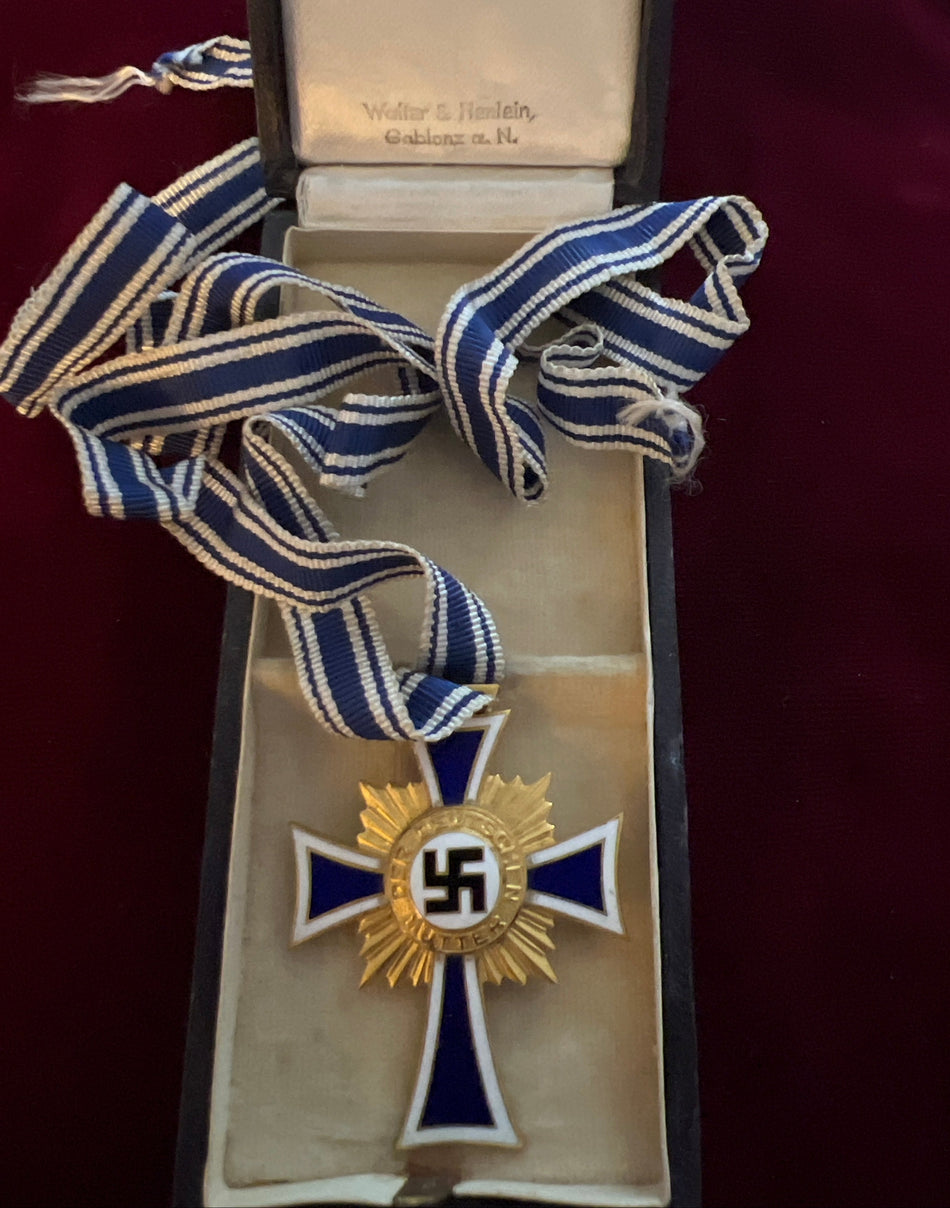 Nazi Germany, Mother’s Cross, 1st Class, in original case of issue, with full neck ribbon, by Walter & Henlein, Gablonz, some wear, a good example of type