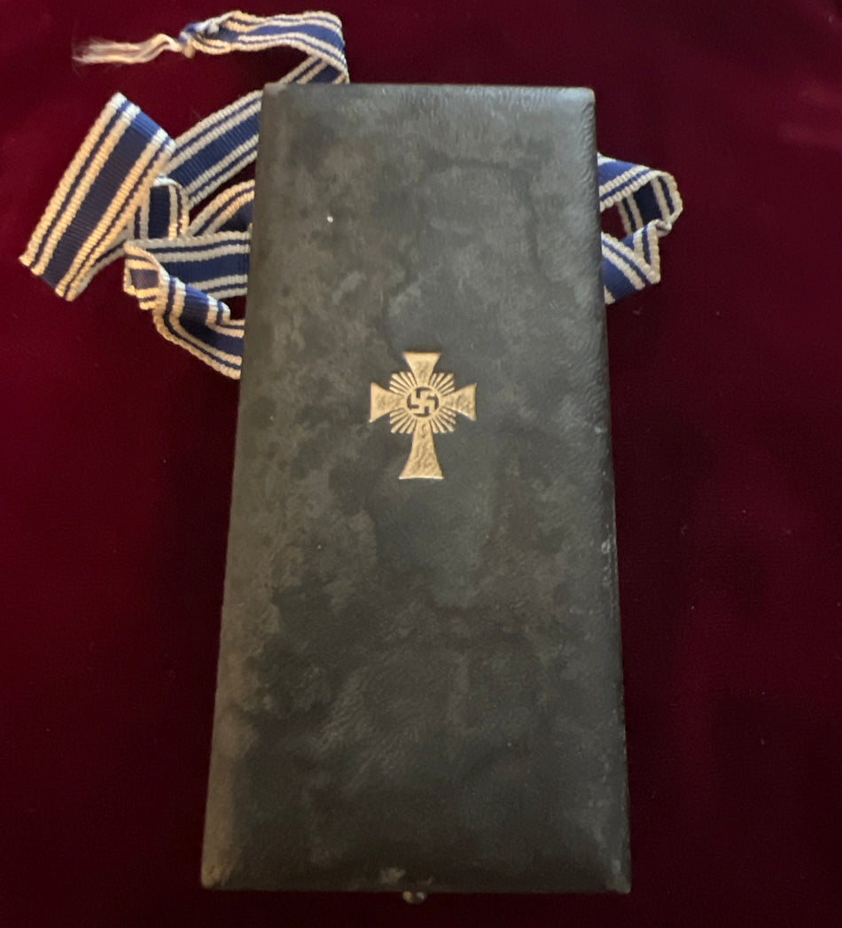 Nazi Germany, Mother’s Cross, 1st Class, in original case of issue, with full neck ribbon, by Walter & Henlein, Gablonz, some wear, a good example of type