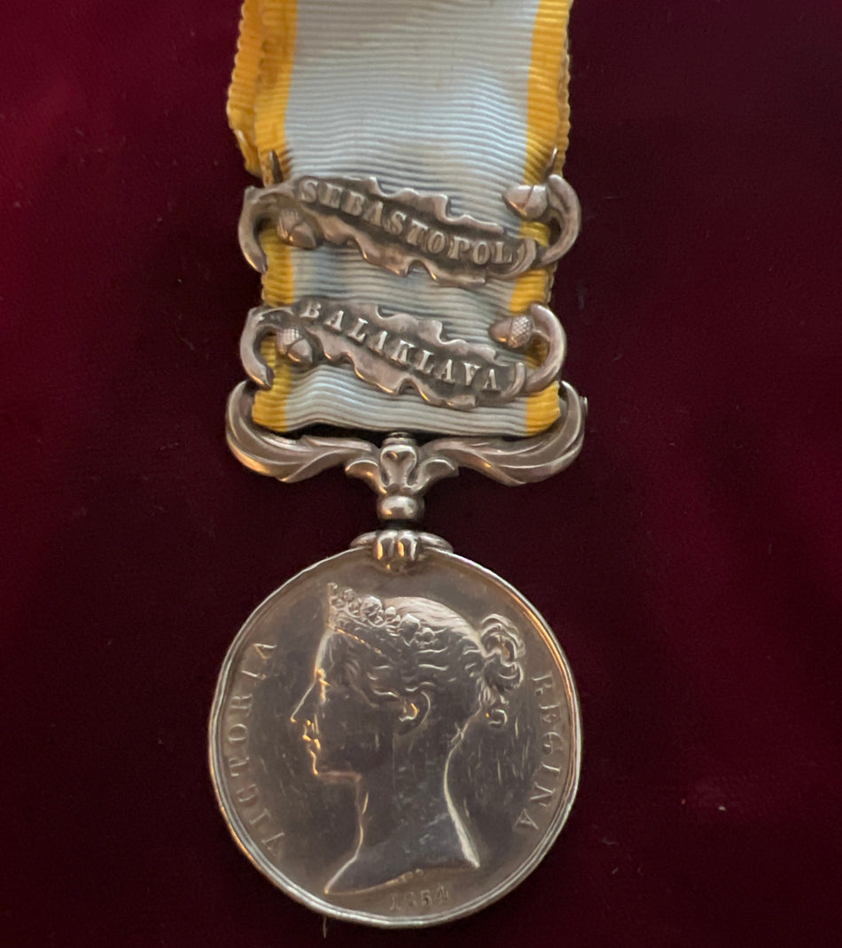 Crimea Medal 1854, two clasps: Balaklava and Sebastopol, to Gunner and Driver William Mc.Stroy, 11th Battery, Royal Artillery, some wear, crudely named