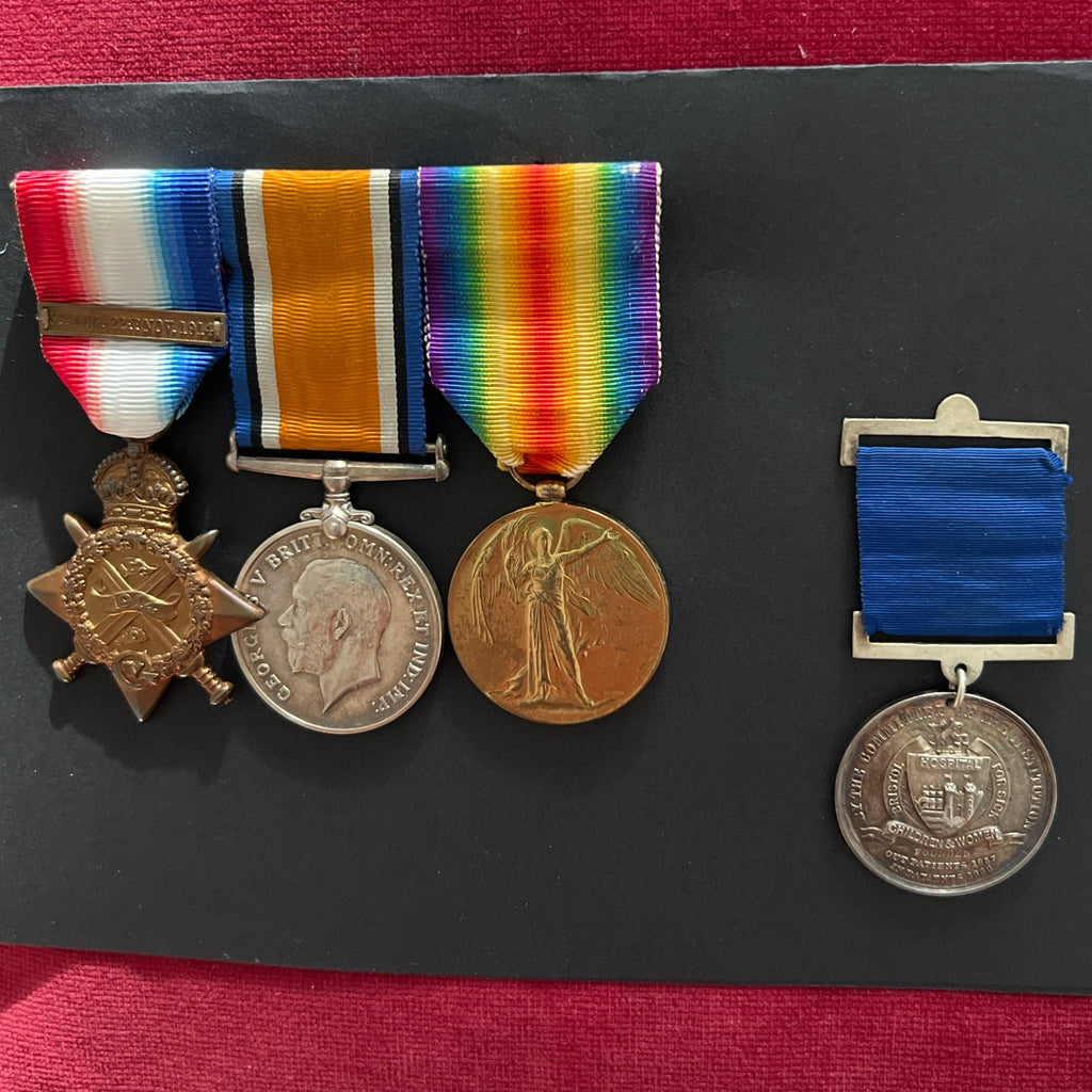 1914 Star with bar/ British War Medal/ Victory Medal trio & school medal to Sergeant Henry Louis Davies, 2 Welsh Regiment, school medal from Bristol Sick Children's Hospital 1800, with history