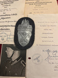 Nazi Germany, Demjansk Arm Shield with original award document (31/12/1943) and award documents for Russian Front Medal (20/11/1942) & War Merit Cross (30/1/1944), awarded to Unteroffizier Herman Nissan, 4 Reserve Fusiliers, Battalion 26, a scarce lot