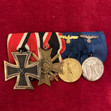 Nazi Germany, group of 4: Iron Cross 1939-45, War Merit Cross with Swords, 4 Years Long Service Medal & 12 Years Long Service Medal