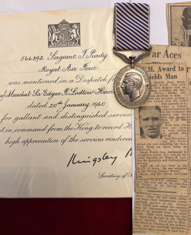Distinguished Flying Medal to Sgt. Pilot Thomas Purdy, RAF. KIA with 57 Sqn 1941 over Eindhoven, he took part in the famous raid of Heligoland Bight 1939 & capital ships at Brunsbuttel with 9 Sqn, with original news cuttings & MiD certificate, see history
