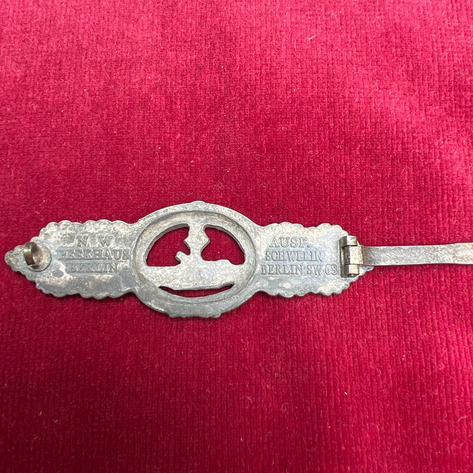 Nazi Germany, Kriegsmarine U-boat Combat Clasp, appears to be bronze, maker marked Schwerin, Berlin, worn, very scarce