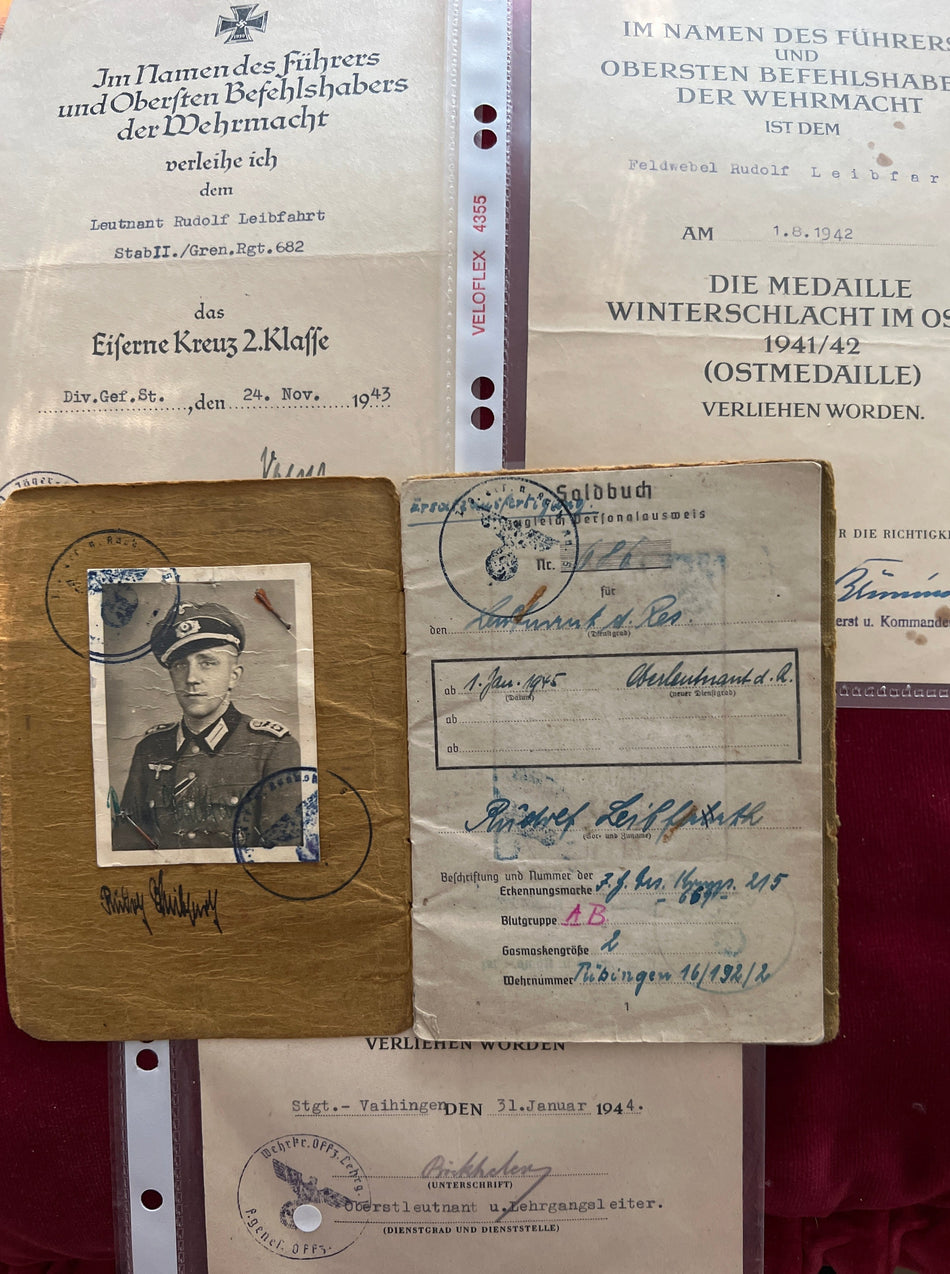 Nazi Germany, group of three documents to Rudolf Lebfarth, an officer of the infantry, served in Russia 1943-44: Iron Cross 2nd class, Winter War Medal & Silver Wound Badge, plus his Soldbuch and full history