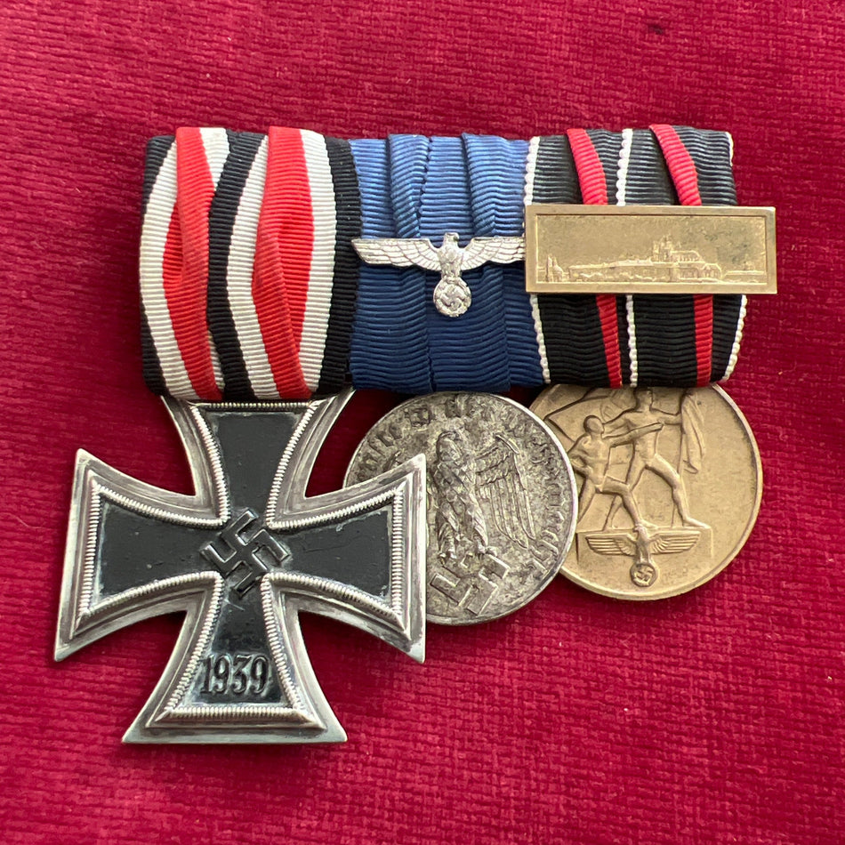 Nazi Germany, group of 3: Iron Cross 2nd class, Armed Forces 4 Years Long Service Medal & Entry into Czechoslovakia Medal, Prague bar