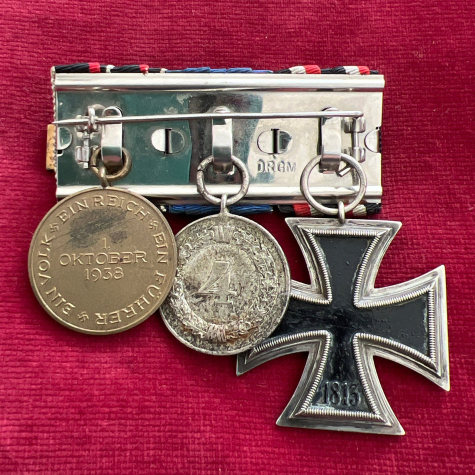 Nazi Germany, group of 3: Iron Cross 2nd class, Armed Forces 4 Years Long Service Medal & Entry into Czechoslovakia Medal, Prague bar