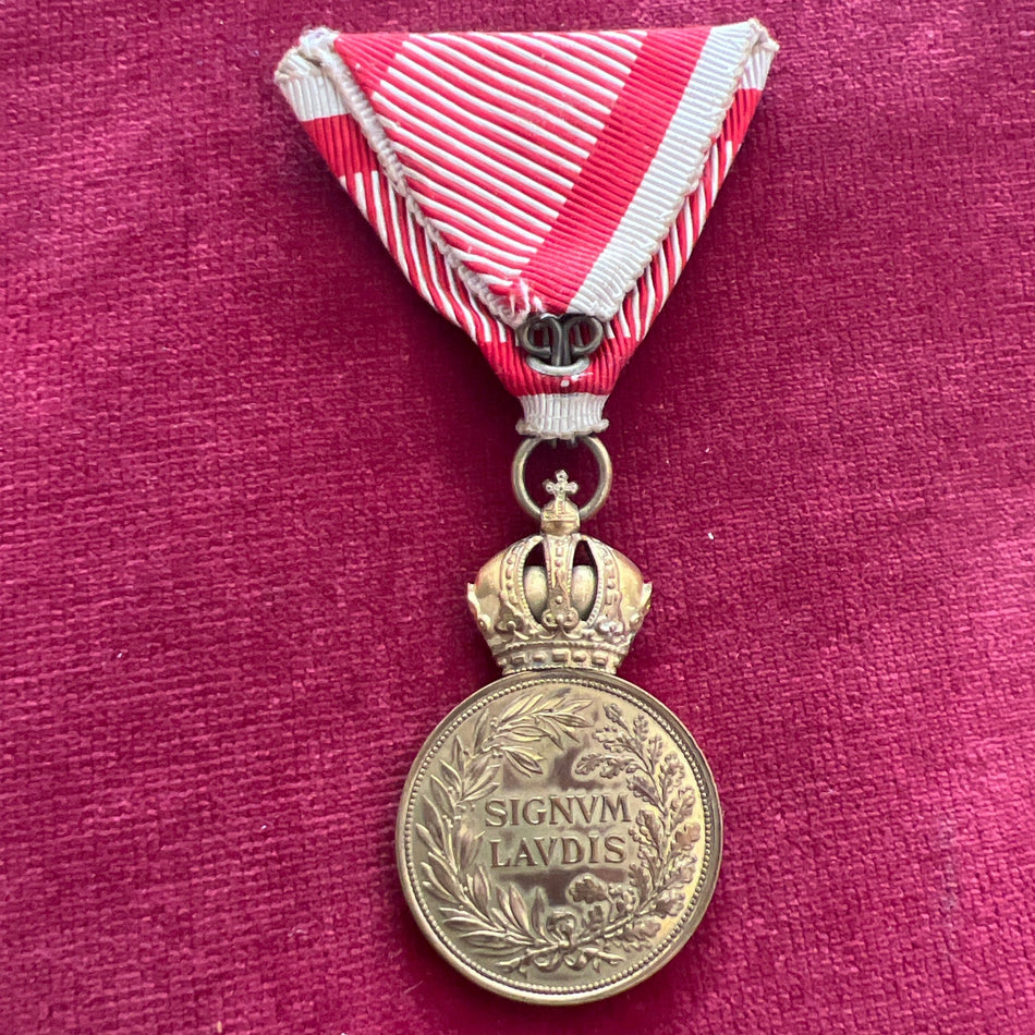 Austria-Hungary, Military Merit Medal (Signum Laudis), gilt bronze, 1st class with swords, on war ribbon, Franz Joseph I