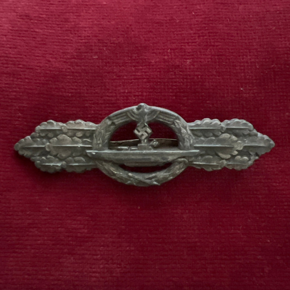 Nazi Germany, Kriegsmarine U-boat clasp in silver, marked Schwerin Berlin, issued late in the war, some wear, a good example of type