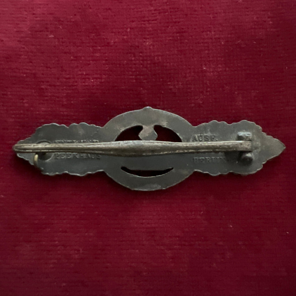 Nazi Germany, Kriegsmarine U-boat clasp in silver, marked Schwerin Berlin, issued late in the war, some wear, a good example of type