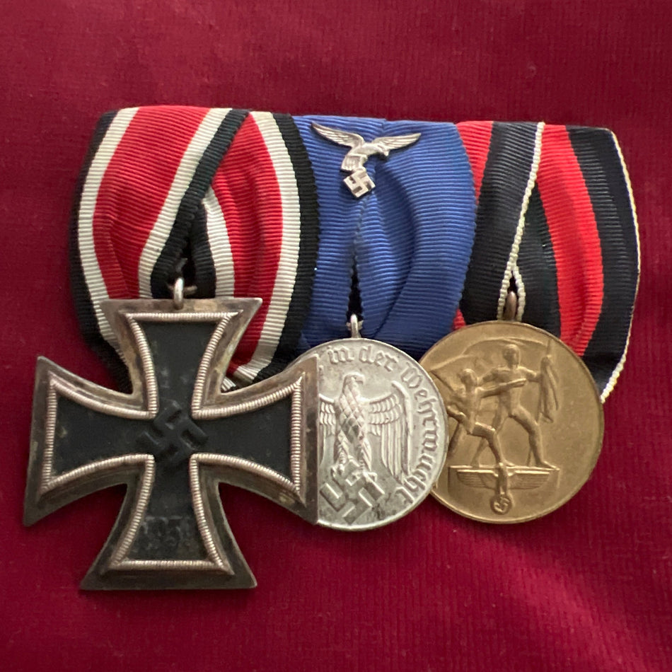 Nazi Germany, Luftwaffe group of 3: Iron Cross 1939-45, 4 Years Armed Forces Long Service Medal with Luftwaffe emblem on ribbon &amp; Entry into Czechoslovakia Medal 1938