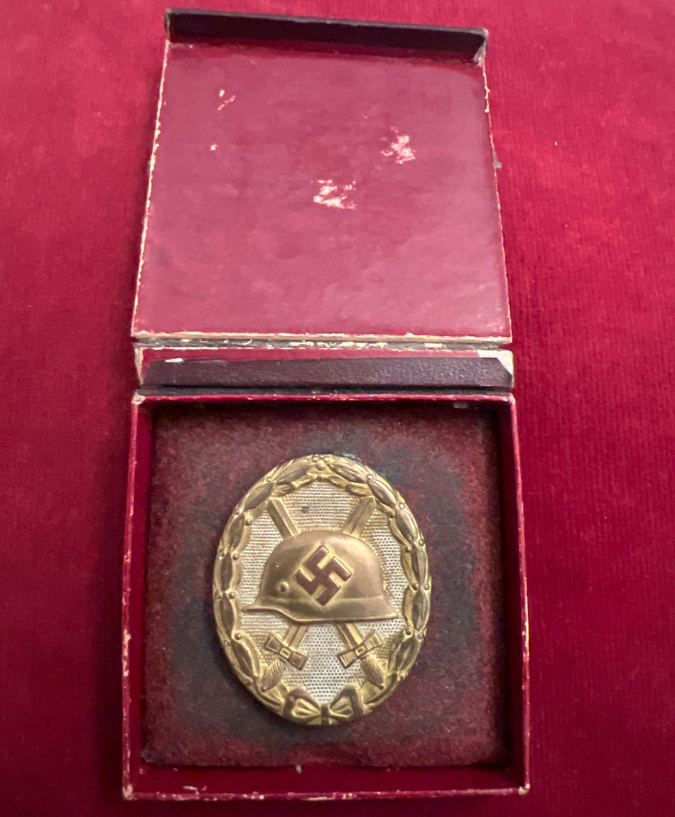 Nazi Germany, Wound Badge, gold class, early type, marked number 30, in battered box