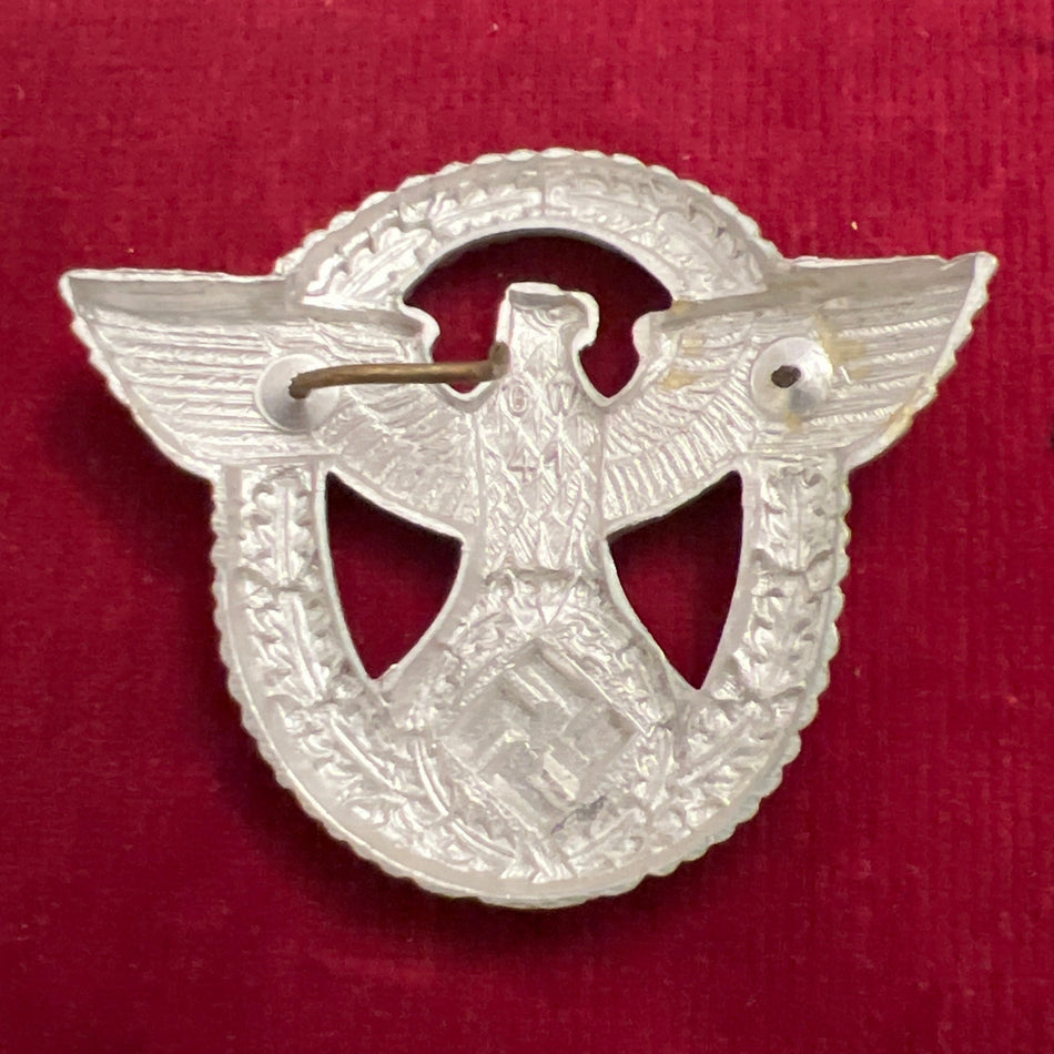 Nazi Germany, police cap badge, marked G.W.41, one pin missing