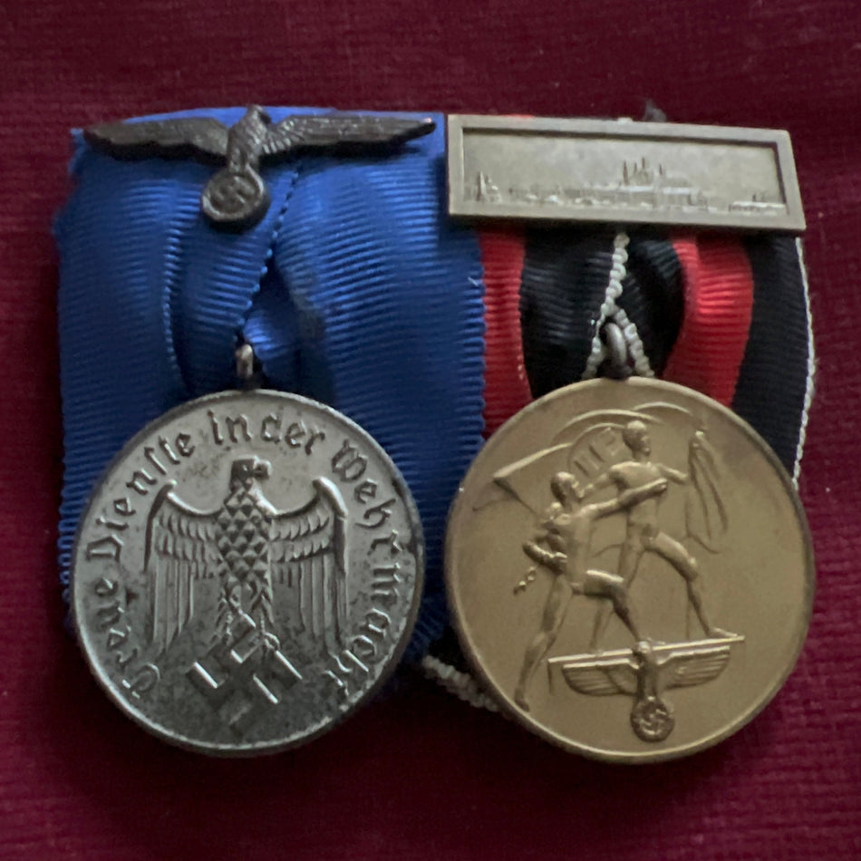 Nazi Germany pair: Armed Forces 4 Years Long Service Medal & Entry into Czechoslovakia with Prague bar