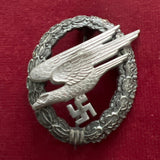 Nazi Germany, Luftwaffe Parachutist Badge, late war, marked A Assman, gilt worn from badge, a good example
