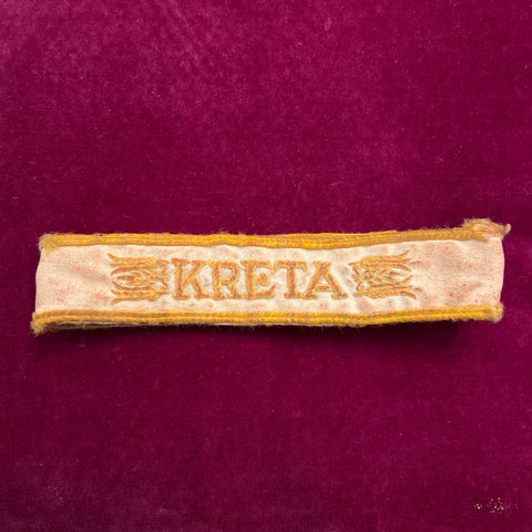Nazi Germany, Kreta Cuff Title, a bit scruffy, marked on reverse, a scarce item
