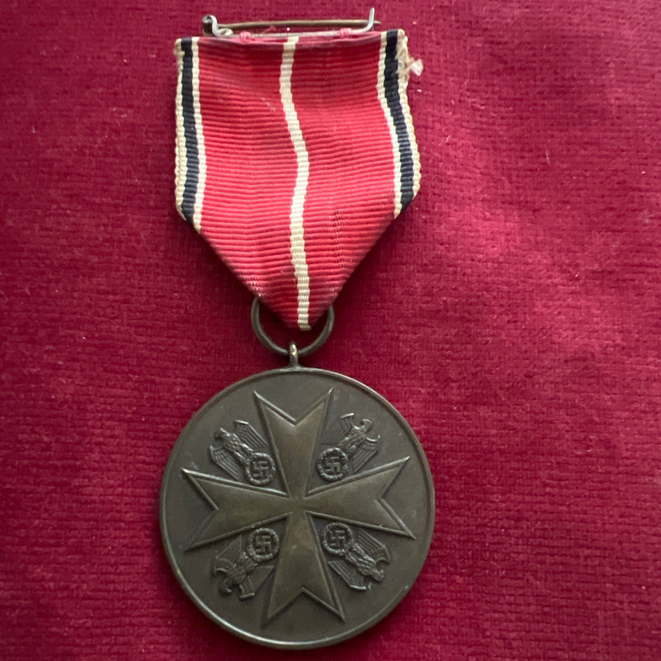 Nazi Germany, Order of the German Eagle Bronze Medal of Merit, scarce with original pin to ribbon