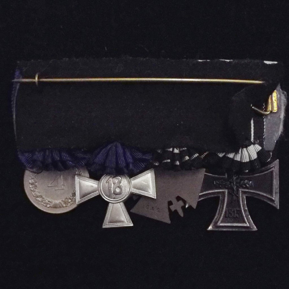 Imperial & Nazi German group of 4. Iron Cross 1914 (2nd class), Cross of Honour (1934), Army 18 Year Long Service (with eagle) & 4 Year Service Medal (with eagle) 3rd Reich issues