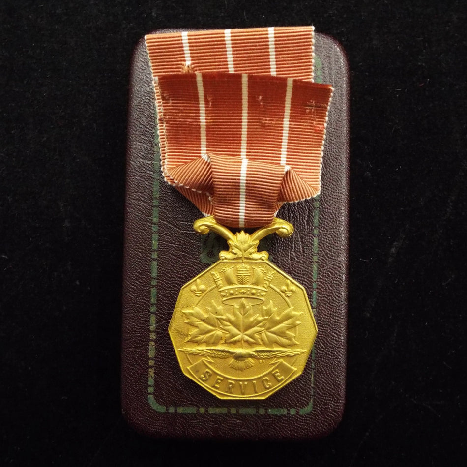 Canadian Forces Decoration in box to Sgt. M. G. Brisco