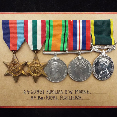 Group of 5 to 6460351 Fusiler E. W. Moore, 8th & 9th Battalions, Royal Fusiliers (T.A.)
